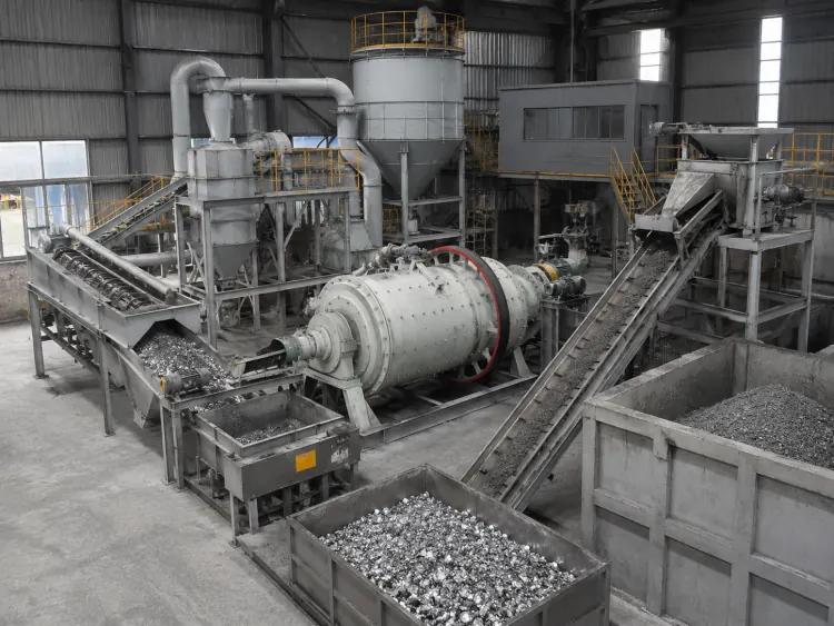 Aluminum ash ball mill surrounded by conveyors, collection bins and separation equipment