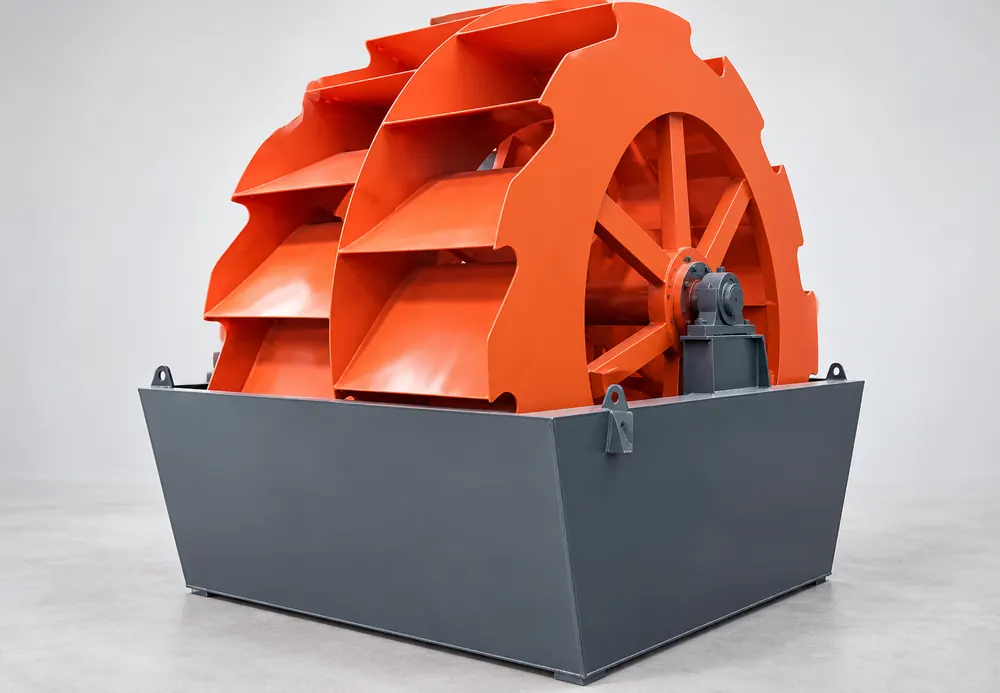 Orange bucket-wheel sand washer in a dark gray rectangular washing tank
